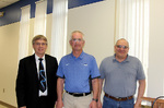 Ernie Fyre (center), reteiree with 37 years of service.jpg